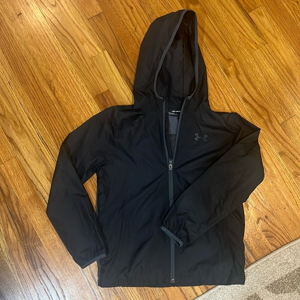 Youth size medium Under Armour rain/ windbreaker jacket.
